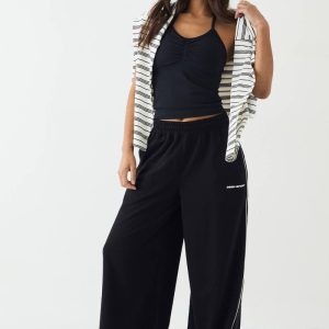 Dam DSGN Studio Joggers med Pipingdetaljer i Midjehög Modell med Vida Ben | Svart | Storlek Medium