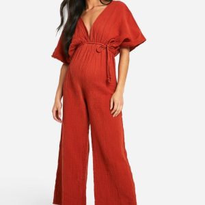 boohoo Dam Mammakläder Jumpsuit med vida ben och knytskärp | Terrakotta | Storlek 42